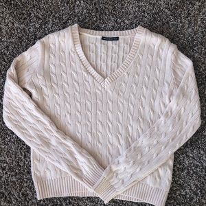 It looks white, but it is a light pink